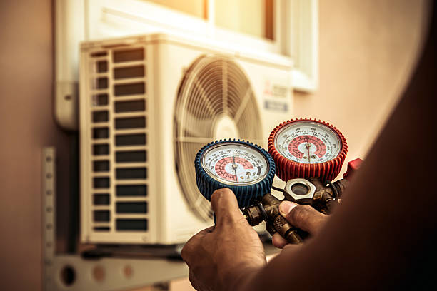 Professional Ductwork Repair technician working in Carver, MA